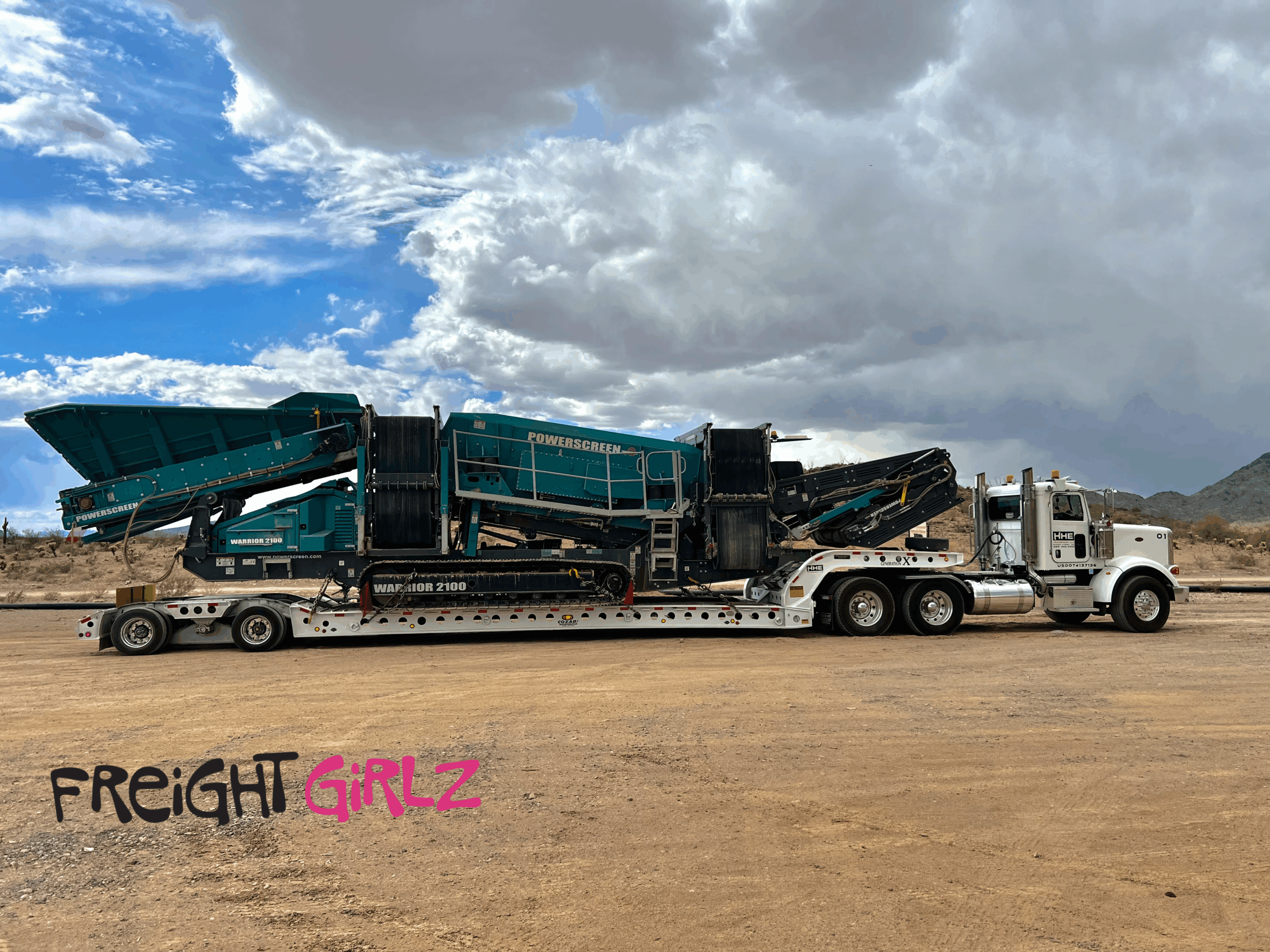 Heavy-haul RGN trailer being dispatched by Freight Girlz